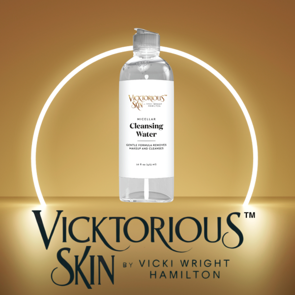 Vivacious Micellar Cleansing Water by Vicktorious Skin in a clear 16 fl oz bottle with a silver cap, displayed against a glowing gold background with the Vicktorious Skin logo.