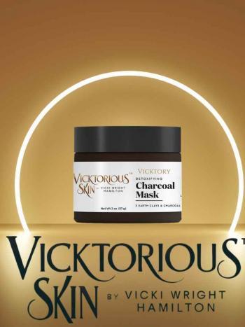 Vicktory Detoxifying Charcoal Mask by Vicktorious Skin in a sleek black jar, designed to detoxify skin and unclog pores using activated charcoal and earth clays.