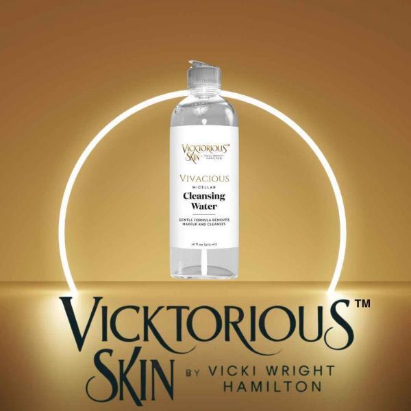 Vivacious Micellar Cleansing Water by Vicktorious Skin in a clear 16 fl oz bottle with a silver cap, displayed against a glowing gold background with the Vicktorious Skin logo.