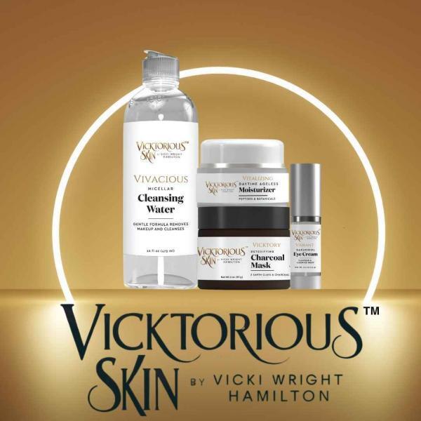 Vicktorious Skin by Vicki Wright Hamilton skincare collection featuring Vivacious Micellar Cleansing Water, Vitalizing Daytime Ageless Moisturizer, Vicktory Detoxifying Charcoal Mask, and Vibrant Bakuchiol Eye Cream on a gold background.